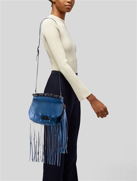 gucci nouveau fringe bag price|Gucci Small Nouveau Fringe Crossbody Bag .